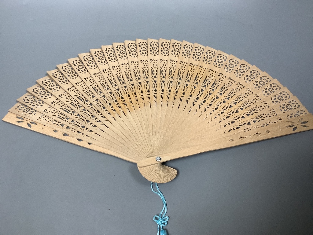 A Brussels lace and ivory fan and four fans